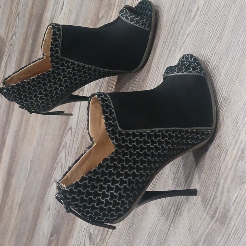 L.A.M.B. Wiatt Open-Toe Bootie in a Black and Blue Colorway. 